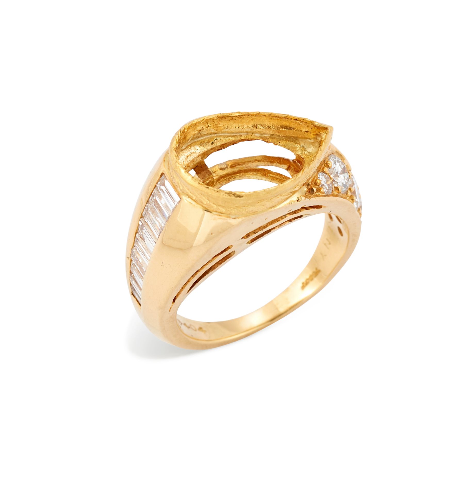 A diamond set ring mount, composed of a central pear-shaped vacant collet, to tapered shoulders, ...