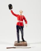 ‘The Shouting Fusilier 1905’, a Michael Sutty bone china porcelain figure, edition no. 3/250, pri...