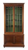 An upper section of a Victorian rosewood bookcase, second quarter 19th century, the glazed doors ...