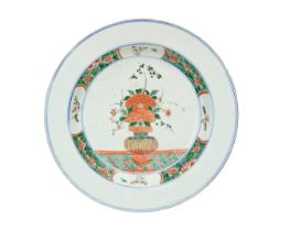 A large Chinese famille verte 'flower vase' plate Qing dynasty, 18th century The wide rim carve...