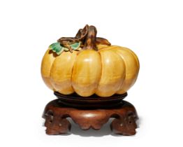 A Chinese yellow-glazed porcelain model of a pumpkin 20th century Covered overall in a yellow g...