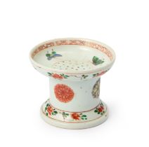 A Chinese famille verte pounce pot Qing dynasty, Kangxi period Rising from splayed foot to cyli...