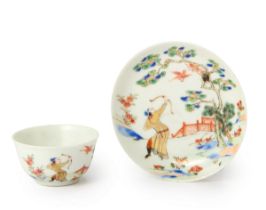 An unusual Chinese famille verte cup and saucer Qing dynasty, 18th century Each enamelled with ...