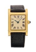 Cartier. A very rare 18ct gold manual wind wristwatch made in the London workshops  Tank Normale ...