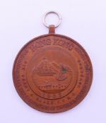 A boxed 1902 Hong Kong medallion. 3.5 cm diameter.