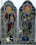 Two antique leaded stained glass panels depicting saints. One 39 x 98 cm, the other 37 x 97.5 cm.