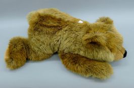 A large Steiff brown bear. 60 cm long.