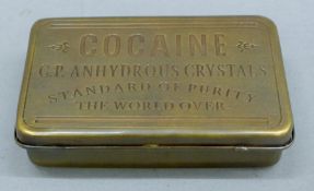 A brass 'cocaine' box. 13.5 cm wide.