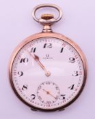 A silver Omega pocket watch. 4.75 cm diameter.