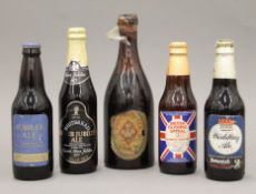 Five bottles of vintage beer,