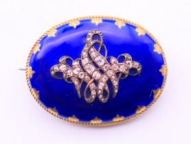 A 19th century diamond and blue enamel mourning brooch. 3.5 x 2.75 cm.