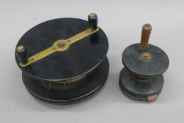 Two vintage line reels. The larger 20 cm diameter.