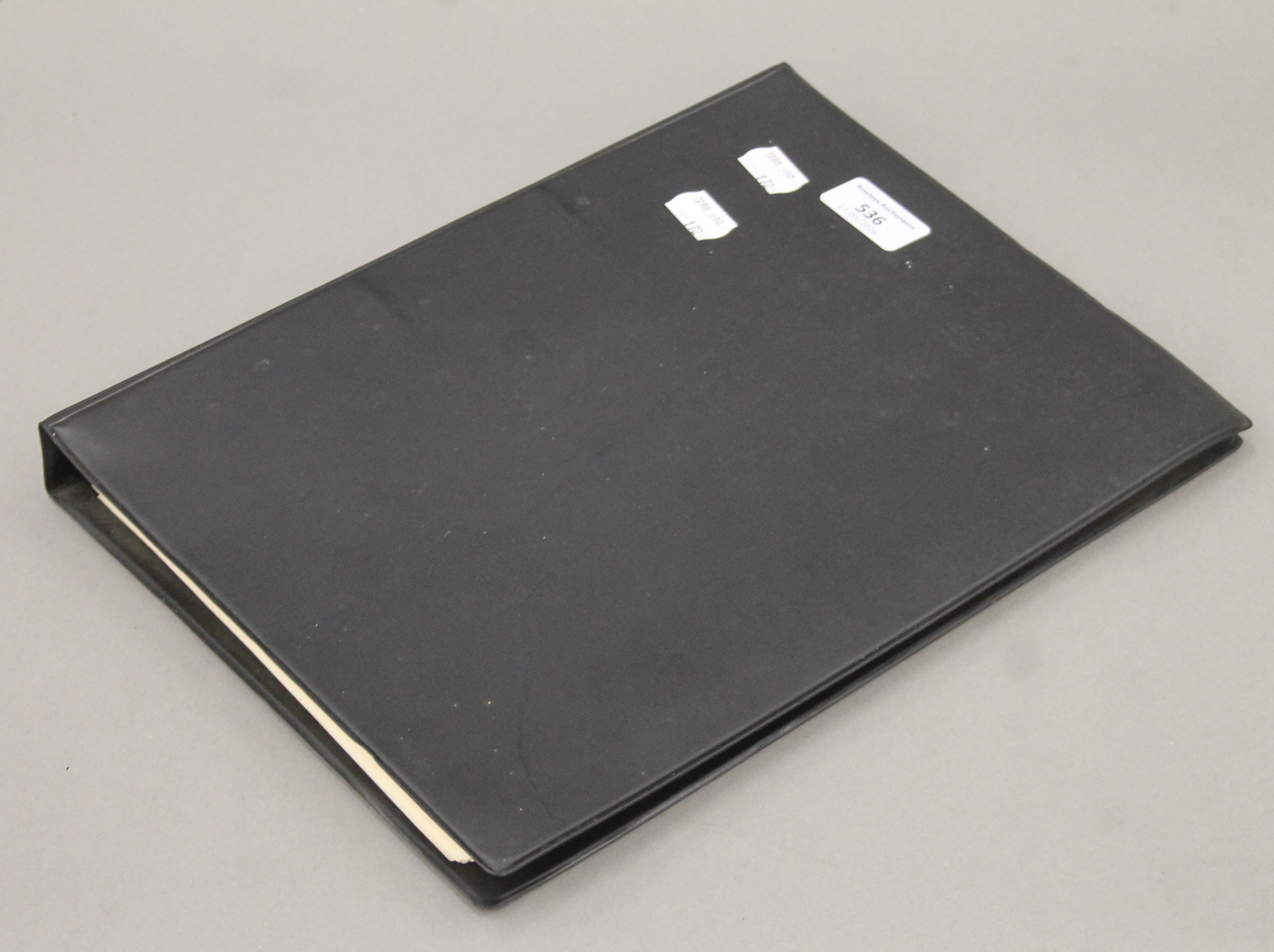 An album of vintage stamps. 24 cm wide. - Image 4 of 4