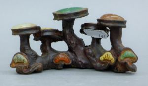 A Chinese hardstone-mounted brush rest. 13 cm wide.