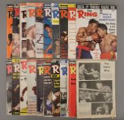 A collection of various vintage 'The Ring' boxing magazines.