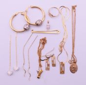A quantity of 9 ct gold jewellery to include earrings, a pendant necklace, a signet ring,