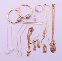 A quantity of 9 ct gold jewellery to include earrings, a pendant necklace, a signet ring,