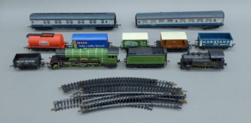 A small quantity of toy locomotives, rolling stock etc. The station building 16.5 cm wide.