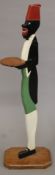 An Art Deco painted wooden figural dumb waiter. 98 cm high.