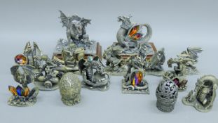 A collection of crystal dragons. The largest 14 cm high.