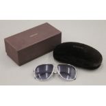 A boxed pair of Tom Ford sunglasses. The box 18 cm wide.