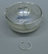 A Liberty & Co silver lidded twin-handled bowl. 12.5 cm wide. 355.3 grammes.
