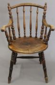 A 19th century bentwood armchair. 62 cm wide.