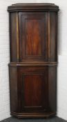 A 19th century mahogany corner cupboard. 98 cm wide x 218 cm high.