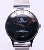 A Calvin Klein wristwatch. 2.5 cm wide including crown.