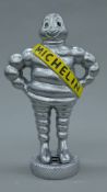 A cast metal 'Michelin' man. 37.5 cm high.