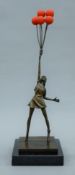 A bronze Banksy-style balloon girl. 46 cm high.