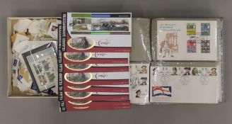 A collection of stamps and First Day covers. The album 25 cm wide.