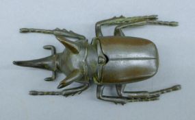 A bronze beetle box. 10.5 cm long.