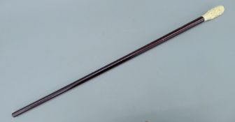 A walking stick, the bone handle formed as a rat. 90 cm long.
