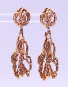 A pair of 9 ct gold textured drop earrings. 7.1 grammes. 4 cm high.