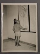 A photographic still from the film 'Life Begins Tomorrow',