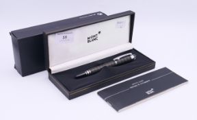 A boxed Mont Blanc ballpoint pen. 14 cm high.