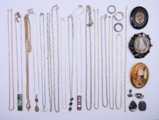 A quantity of various silver and other jewellery to include necklaces, brooches, rings, etc.