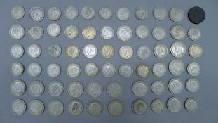 A collection of British coins and notes.