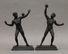 A pair of Art Deco spelt figures of athletes. The larger 33 cm high.