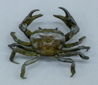 An articulated bronze crab. 10 cm wide.