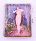 A silver and enamel cigarette case decorated with Eve and the snake. 8.5 cm high. 126.