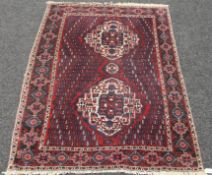 A Persian handmade Afshar rug. 202 x 147 cm.