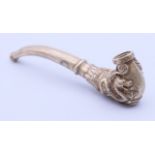 A Chinese white metal dragon pipe. 10 cm long.