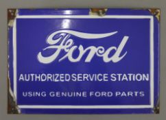 A 'Ford' enamel sign. 30 cm wide.