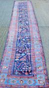 An antique Persian handmade Malayer runner. 508 x 92 cm.
