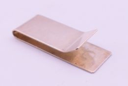 A silver banknote clip hallmarked for Birmingham 1993. 5 x 2 cm. 13.9 grammes.