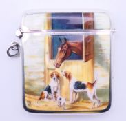 A 925 silver and enamel vesta case. Decorated with a horse and hounds. 5 cm high.