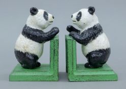 A pair of cast iron panda bookends. 12.5 cm high.