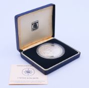 A boxed silver proof Operation Raleigh coin, with certificate.